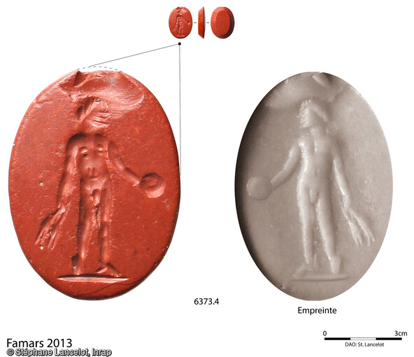 Intaille en jaspe rouge repr&eacute;sentant un dieu lare portant dans sa main droite une pat&egrave;re et dans sa main gauche des &eacute;pis de bl&eacute; rempla&ccedil;ant la corne d'abondance.